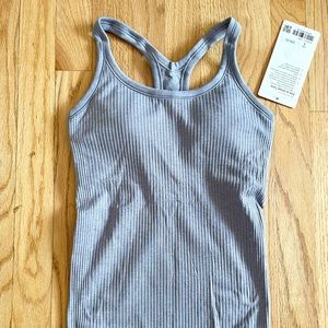 Never worn workout tank! Perfect condition.